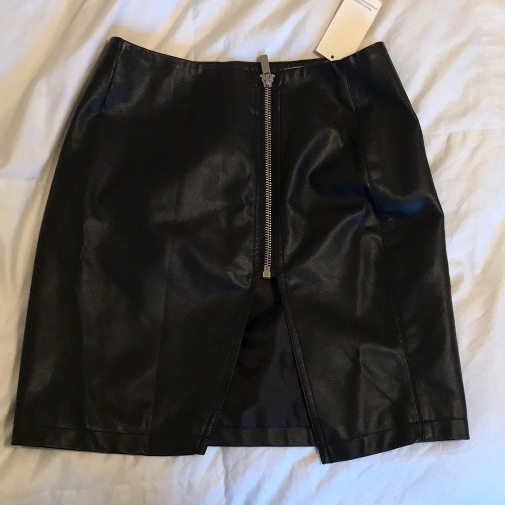 Super cute faux leather skirt, never worn!